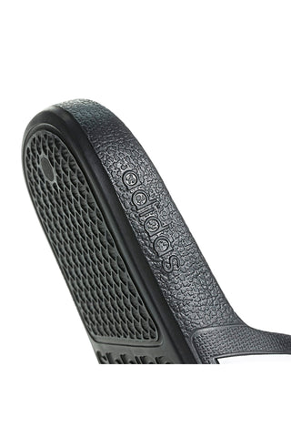 Črne in bele natikače z Adidas Adilette Aqua K črtami