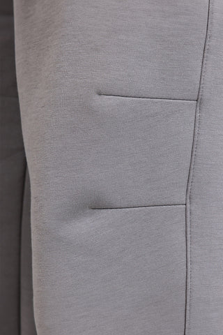 Sive jogger hlače z elastičnim pasom in silikonskim logotipom JOMA Step Long Pants