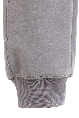 Sive jogger hlače z elastičnim pasom in silikonskim logotipom JOMA Step Long Pants