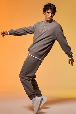 Sive jogger hlače z elastičnim pasom in silikonskim logotipom JOMA Step Long Pants