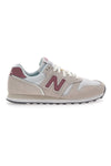 Superge MoonBeam z logotipom na strani New Balance 373