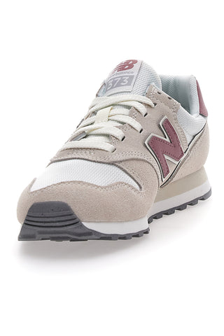 Superge MoonBeam z logotipom na strani New Balance 373