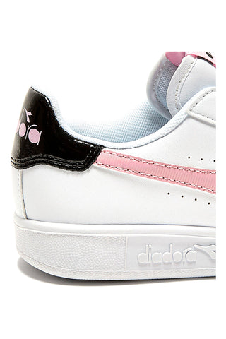 Bele in roza superge z logotipom DIADORA GAME P GS GIRL na strani