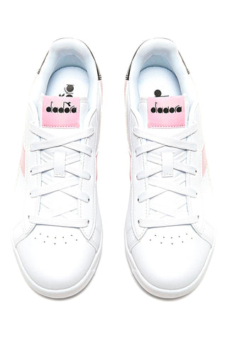 Bele in roza superge z logotipom DIADORA GAME P GS GIRL na strani