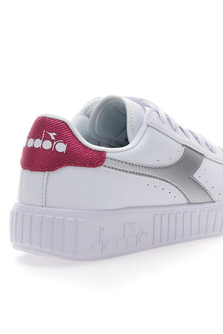 Bele superge s srebrnim logotipom DIADORA GAME STEP METAL GS