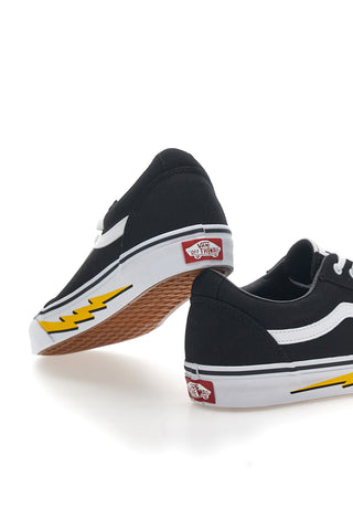 Črni in beli superge z bliskavico na strani Vans Ward
