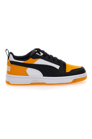 Rumene in črne superge z vezalkami Puma Rebound V6 Lo Jr