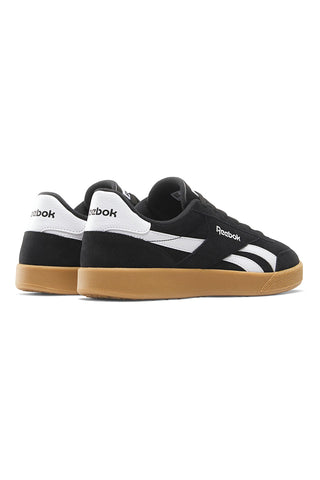 Črni in beli športni copati Reebok Smash Edge