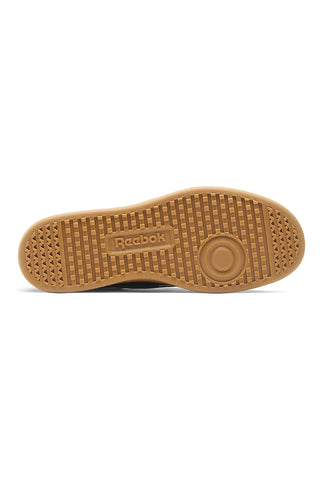 Črni in beli športni copati Reebok Smash Edge