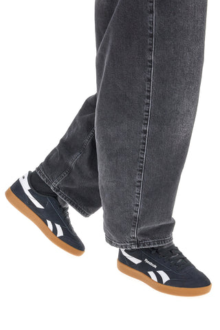 Črni in beli športni copati Reebok Smash Edge