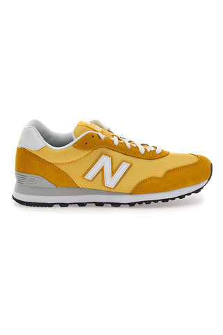 Rumene superge z logotipom na strani New Balance 515