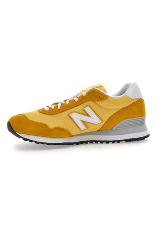 Rumene superge z logotipom na strani New Balance 515