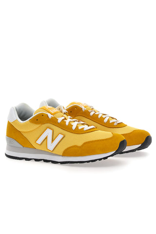 Rumene superge z logotipom na strani New Balance 515