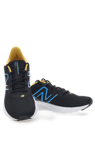 Črni in rumeni tekaški čevlji z mrežastim zgornjim delom NEW BALANCE 411