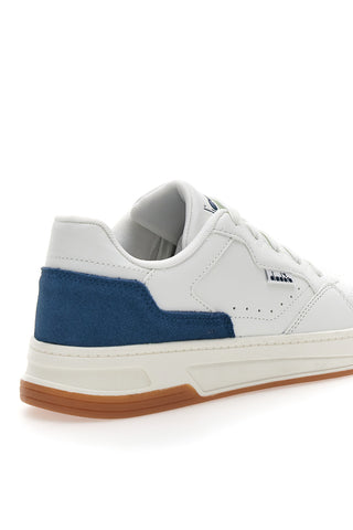 Bele superge z modrim usnjenim detajlom na zadnji strani DIADORA GINGER