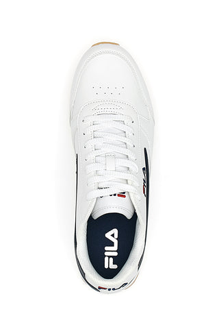 Bele in modre superge imajo izvlečno vložek Fila Orbit.