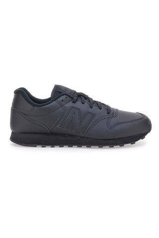 Ikonični črni športni copati iz tehničnega materiala New Balance GM500