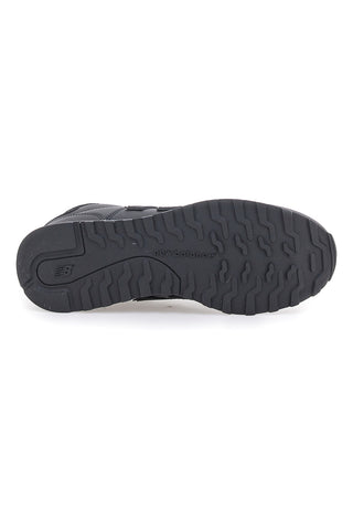 Ikonični črni športni copati iz tehničnega materiala New Balance GM500