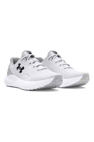 Beli in svetlo sivi tekaški copati z zračno mrežo in blaženjem Charged Cushioning Under armour Charged Surge 4