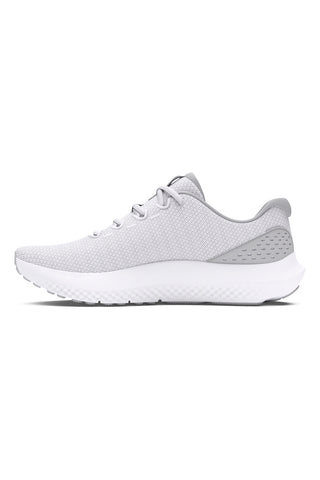 Beli in svetlo sivi tekaški copati z zračno mrežo in blaženjem Charged Cushioning Under armour Charged Surge 4