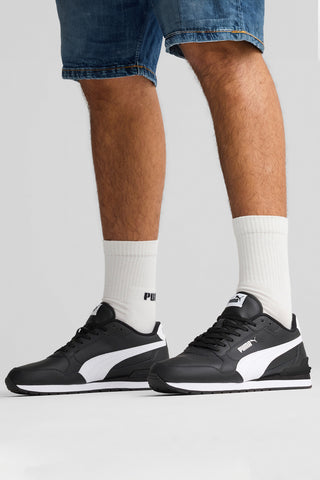 Črni športni copati z belimi detajli in podplatom SoftFoam+ Puma ST Runner v4 L