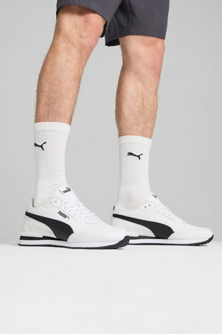 Beli usnjeni športni copati s črnimi podrobnostmi Puma ST Runner v4 L