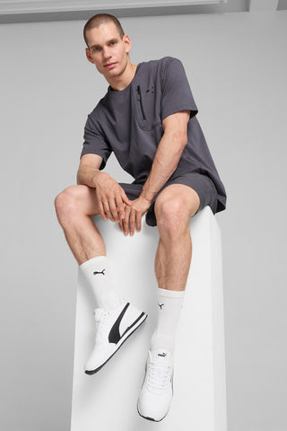 Beli usnjeni športni copati s črnimi podrobnostmi Puma ST Runner v4 L