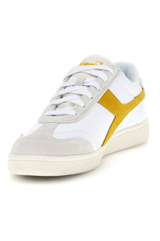Bele superge z rumenim vložkom Diadora Kick Sl