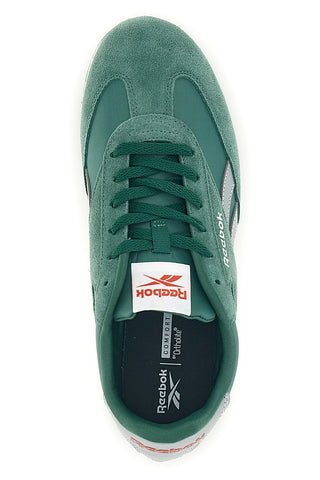 Zelene športne copate z vložki iz semiša in Ortholite Reebok World 70