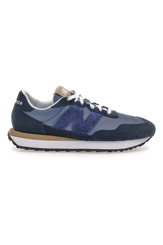 Modra trenirka z usnjenimi vložki New balance M2374EK