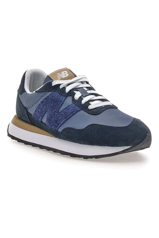 Modra trenirka z usnjenimi vložki New balance M2374EK