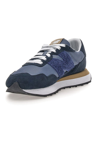 Modra trenirka z usnjenimi vložki New balance M2374EK