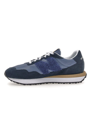 Modra trenirka z usnjenimi vložki New balance M2374EK