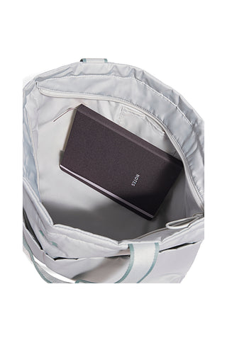 Torba čez ramo Salvia s prednjimi žepi UNDER ARMOUR STUDIO LITE TOTE