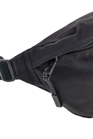 Črna torbica iz blaga z logotipom Calvin Klein CK3116