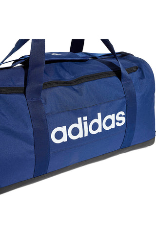 Modra torba z ojačanimi ročaji in belim logotipom Adidas IN6116