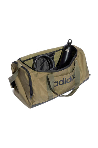 Zelena torba z logotipom Adidas Linear Duffel na strani