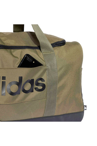 Zelena torba z logotipom Adidas Linear Duffel na strani